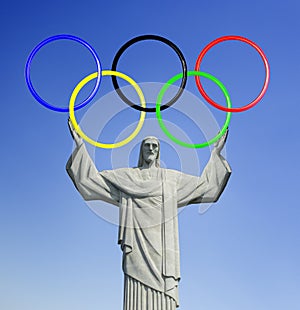 Rio 2016. Christ the Redeemer, on top of Corcovado mountain in Rio de Janeiro. Holding Olympic rings.